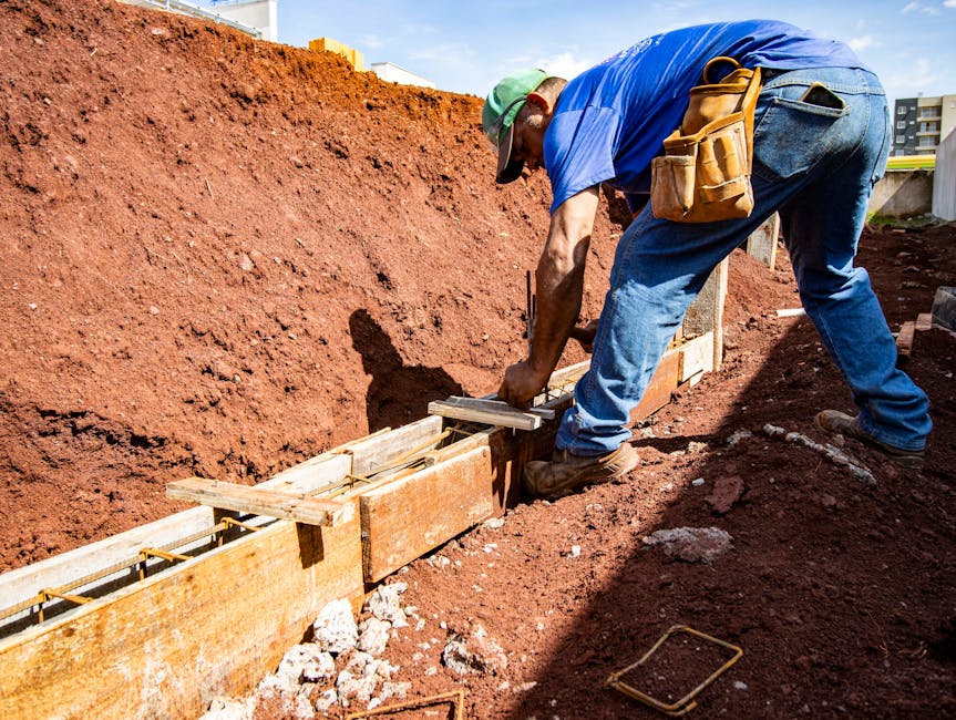 Excavation and footings dug for a new house foundation
